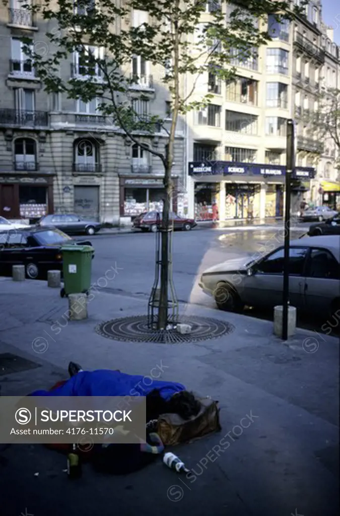 Homeless sleeping in the street, Paris