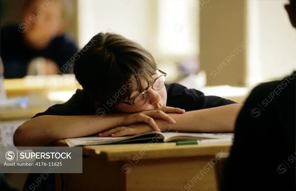 Student sleeping at his desk