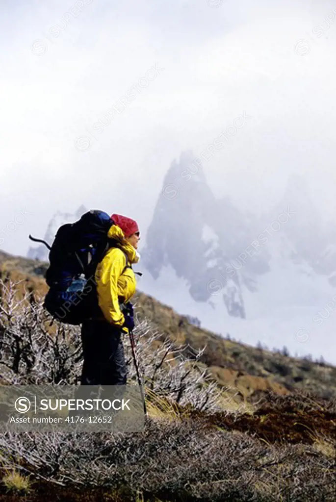 A hiker with backpack at Fitz Roy mountain in Argentina, USA