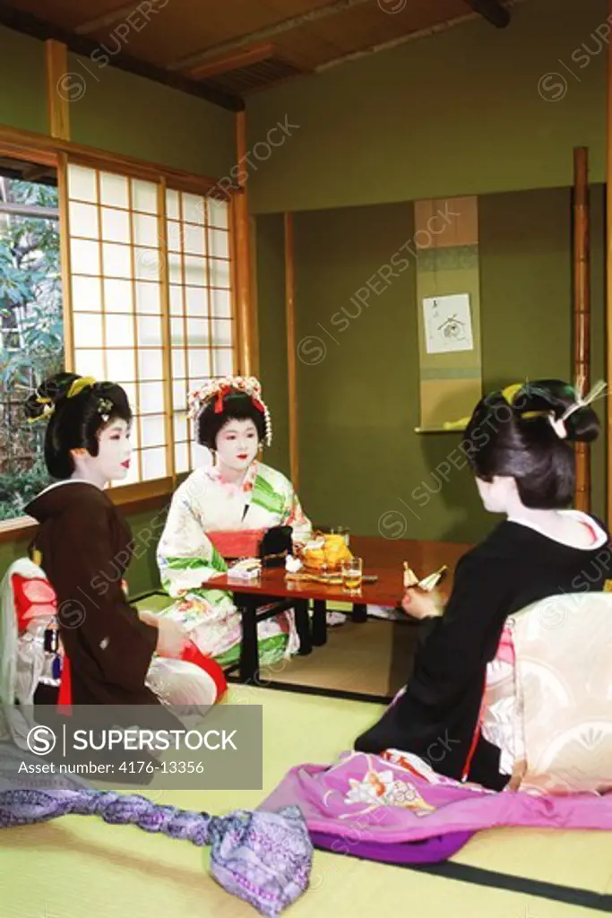 Maiko-san or Geishas in a tea house in Tokyo, Japan