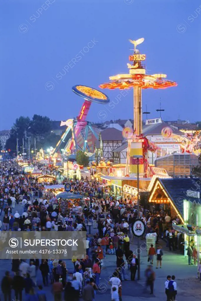 The Oktoberfest rides and crowds at night in Munich