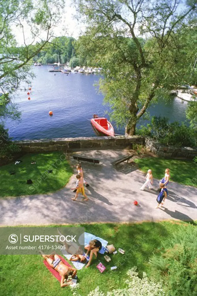 Summer activities on Reimersholme Island and canal in Stockholm