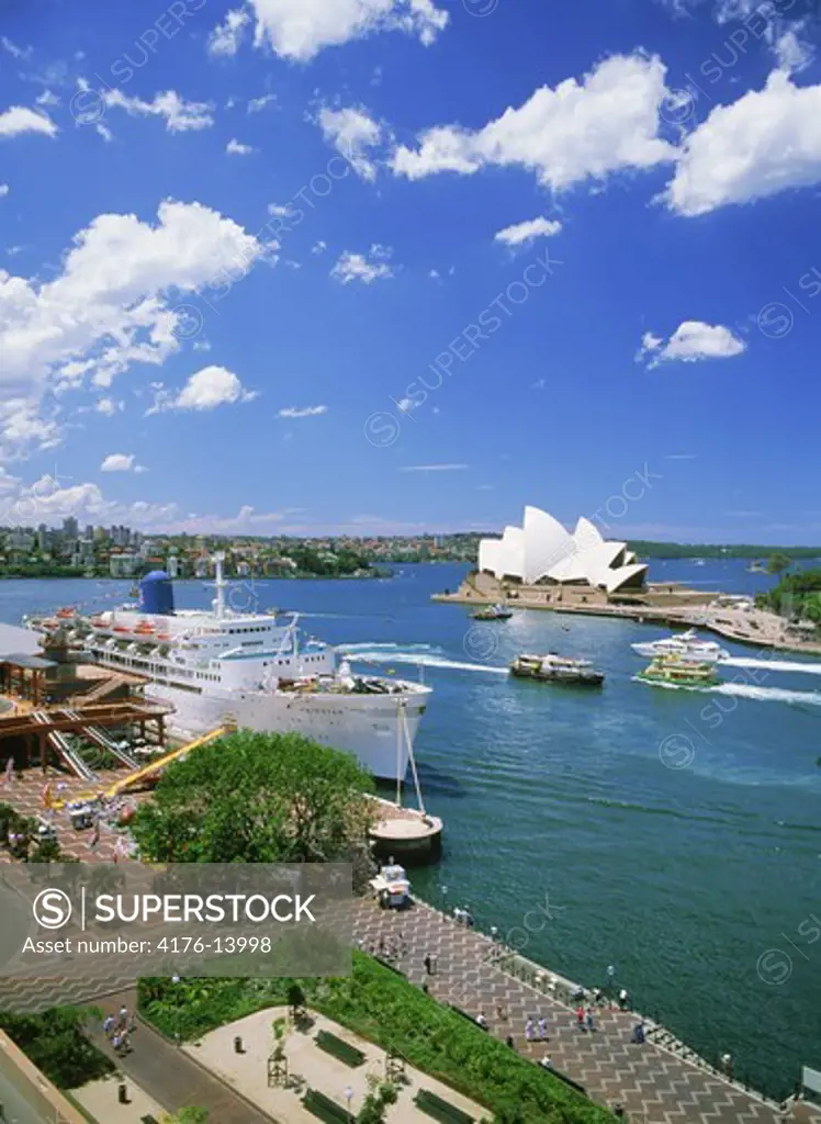 Passenger ships and ferryboats at the Sydney Harbor Quay with Opera House