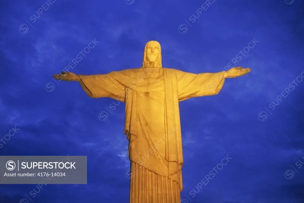 The Christ of Corcovado looking over Rio de Janeiro illuminated at night