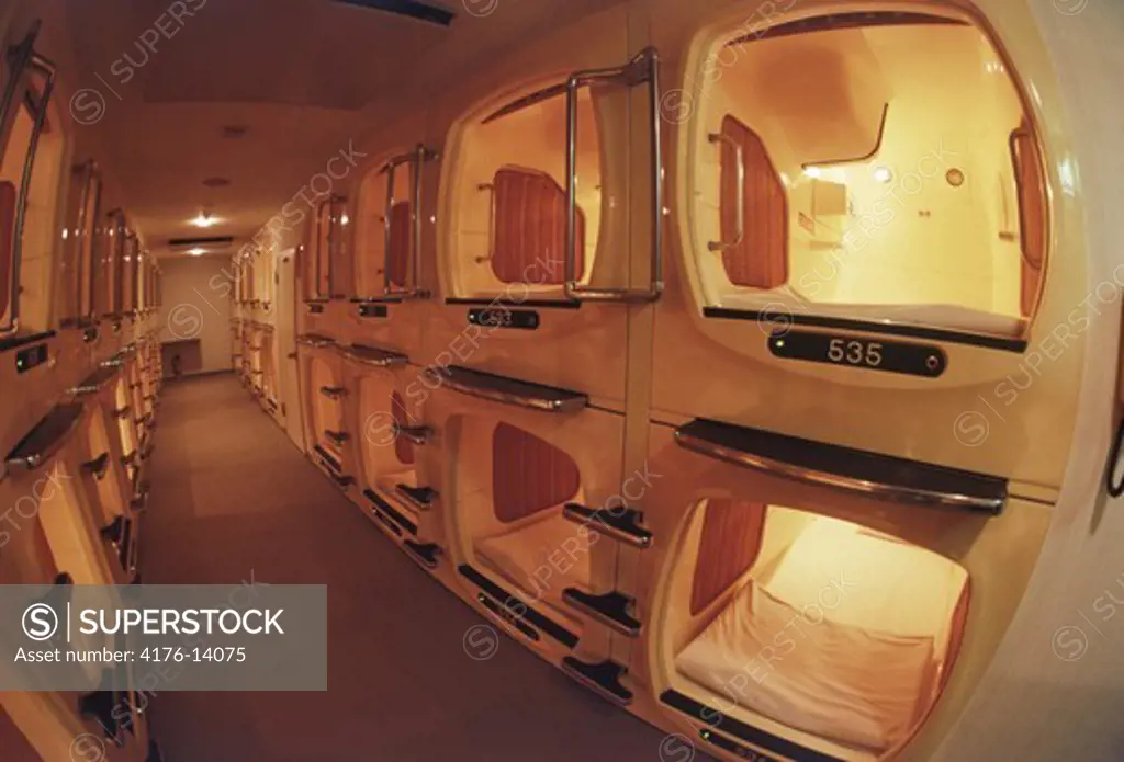 Traditional businessman's capsule hotel with small individual rooms in Japan