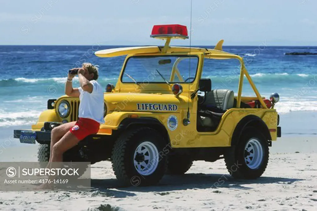 Lifeguard and yellow jeep at Laguna Beach in Southern California USA