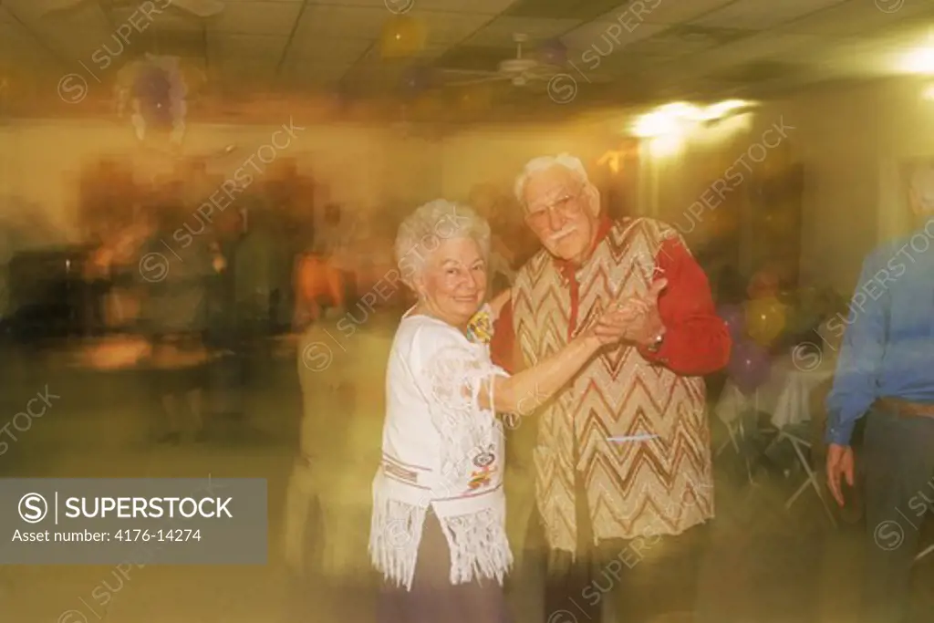 Senior citizens dancing in Southwest USA clubhouse