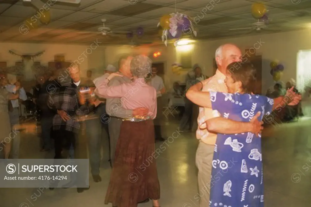 Elderly couples dancing in local clubhouse in Soutwest USA