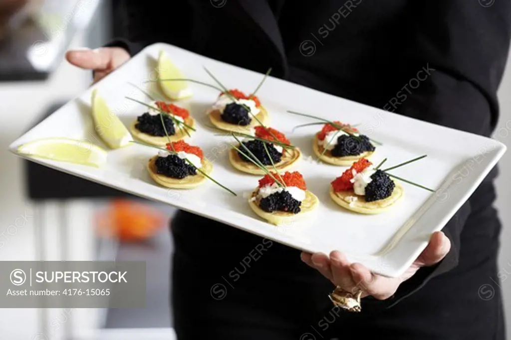 Toppings on biscuits served in a tray