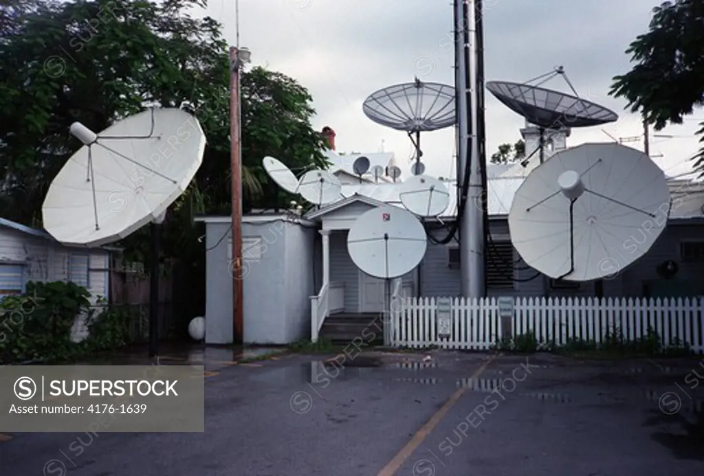 A house with many satellite dishes in Key West, Florida, USA