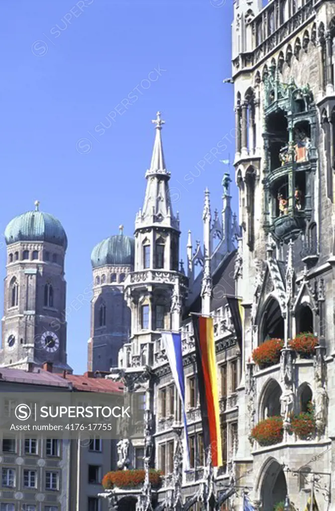 GERMANY BAYERN MUNICH MARIENPLATZ NEW TOWN HALL AND THE TWO ONION SPIRES OF FRAUENKIRCHE