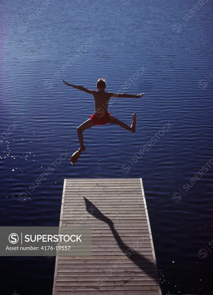 Diver jumping in the water