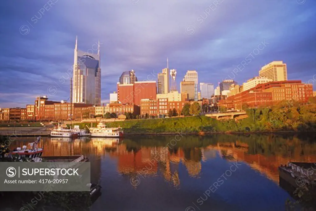 Sunrise against Nashville skyline over Cumberland River in Tennessee