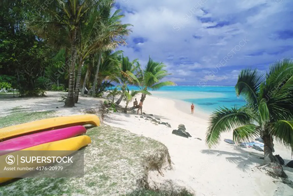 Canoes and sandy shores on Rarotonga in Cook Islands South Pacific