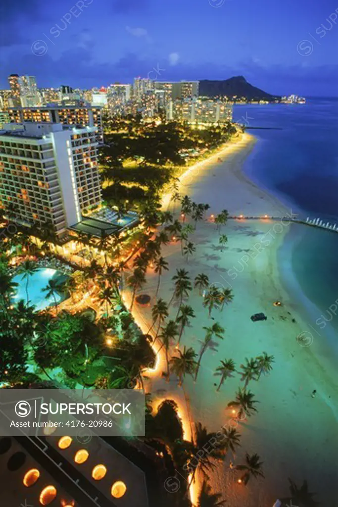 Overview of Waikiki beaches with Diamond Head at twilight