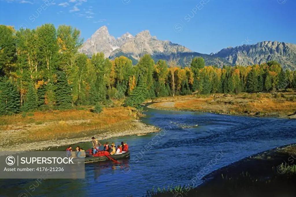 River rafting down the Snake River below the Grand Tetons in Wyoming in autumn