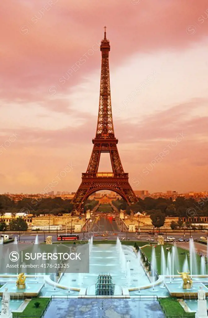 Eiffel Tower and Trocadero Gardens with fountains in Paris at sunset