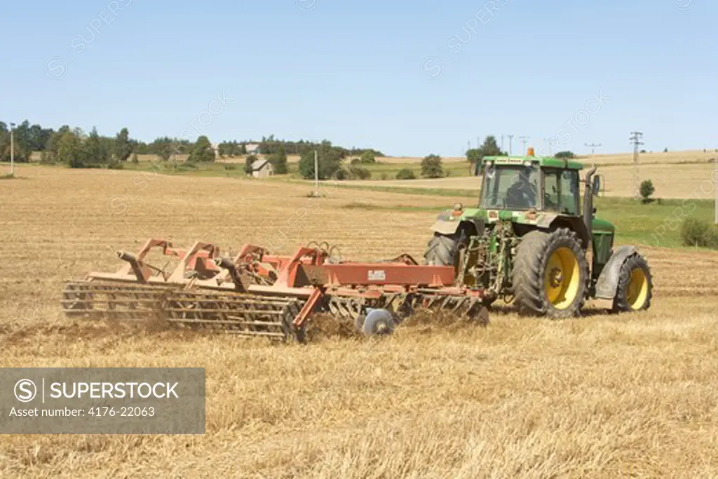 AGRICULTURE PLOWING THE FIELD
