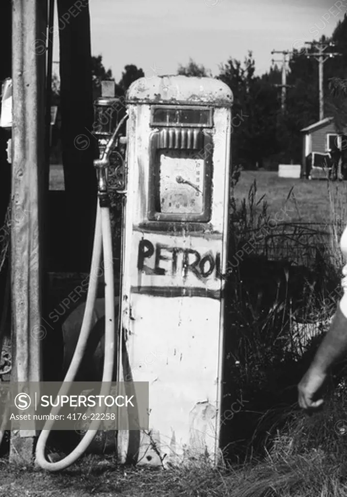 An old petrol pump machine at the filling station