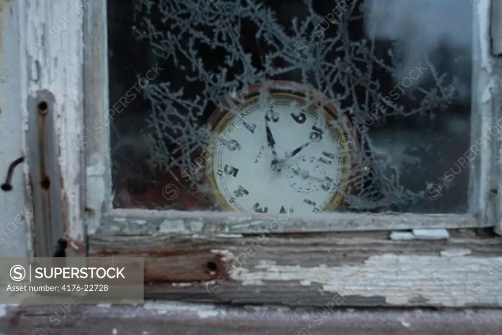 Clock in a corner of a window, Varmland Sweden
