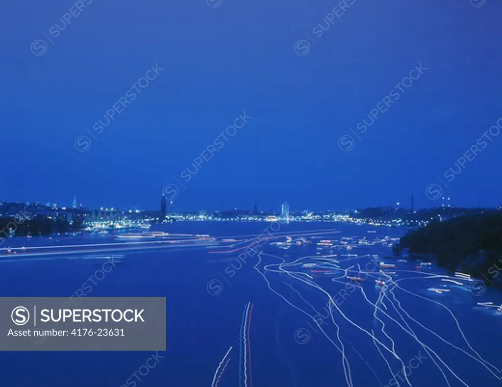 SWEDEN STOCKHOLM BOAT TRAFFIC ON LAKE MíLAREN AT NIGHT