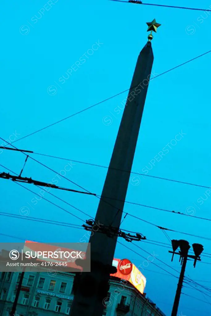 Obelisk against Coca Cola ad. Russia
