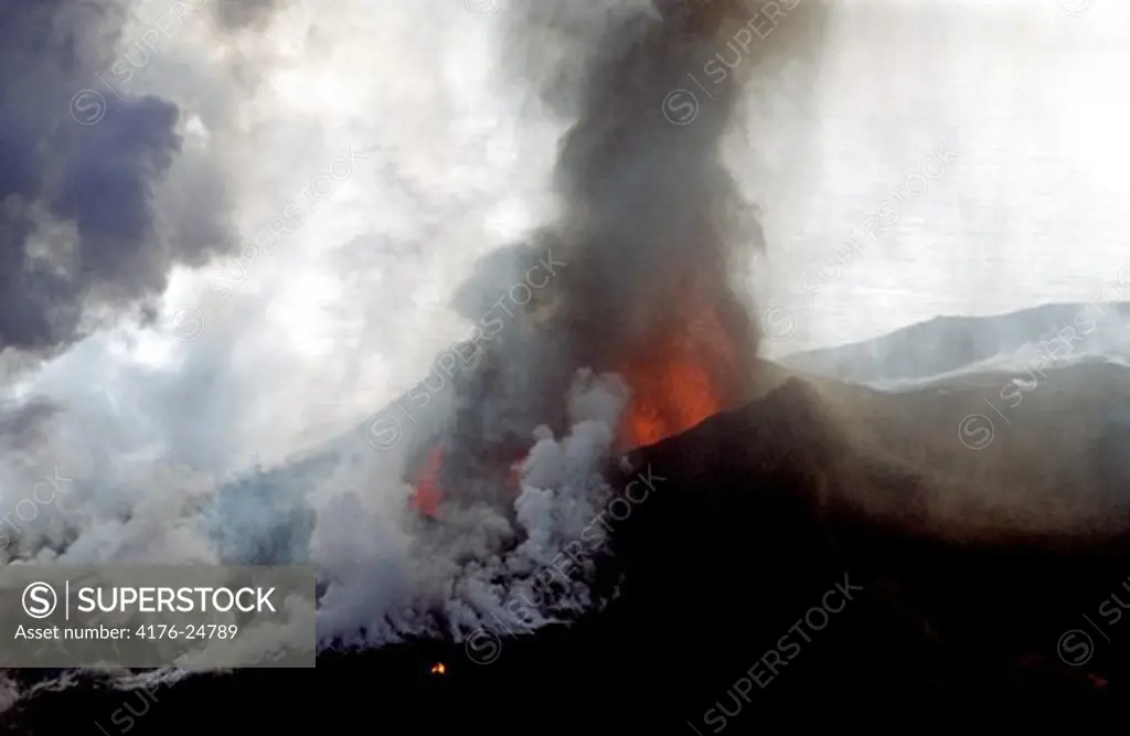 Iceland - High angle view of volcano with smoke
