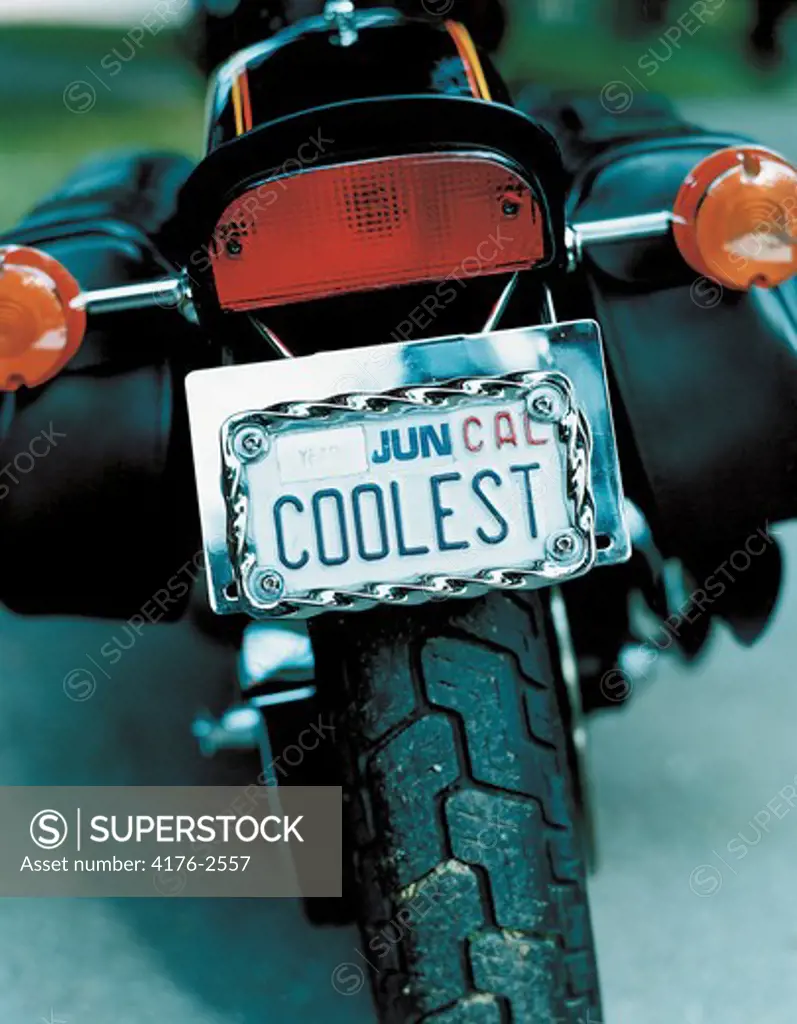 Close-up of a vanity plate on a motorcycle