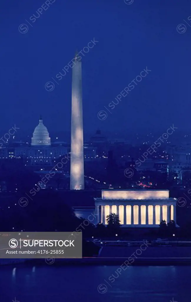 Lincoln Memorial, Washington Monument and Capitol Building illuminated at night in Washington DC