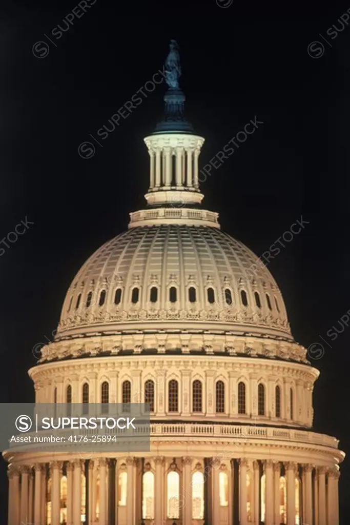 Capitol Building dome in Washington D C at night