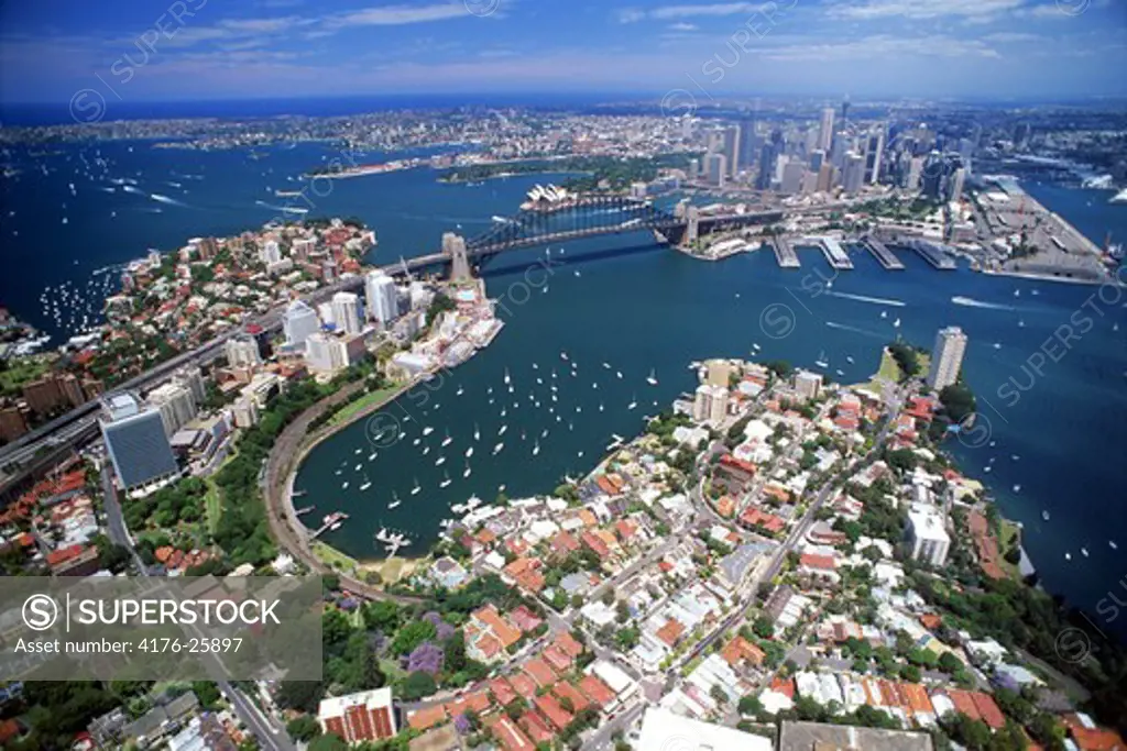 Aerial view of Sydney with Harbour Bridge and Opera House from above North Sydney