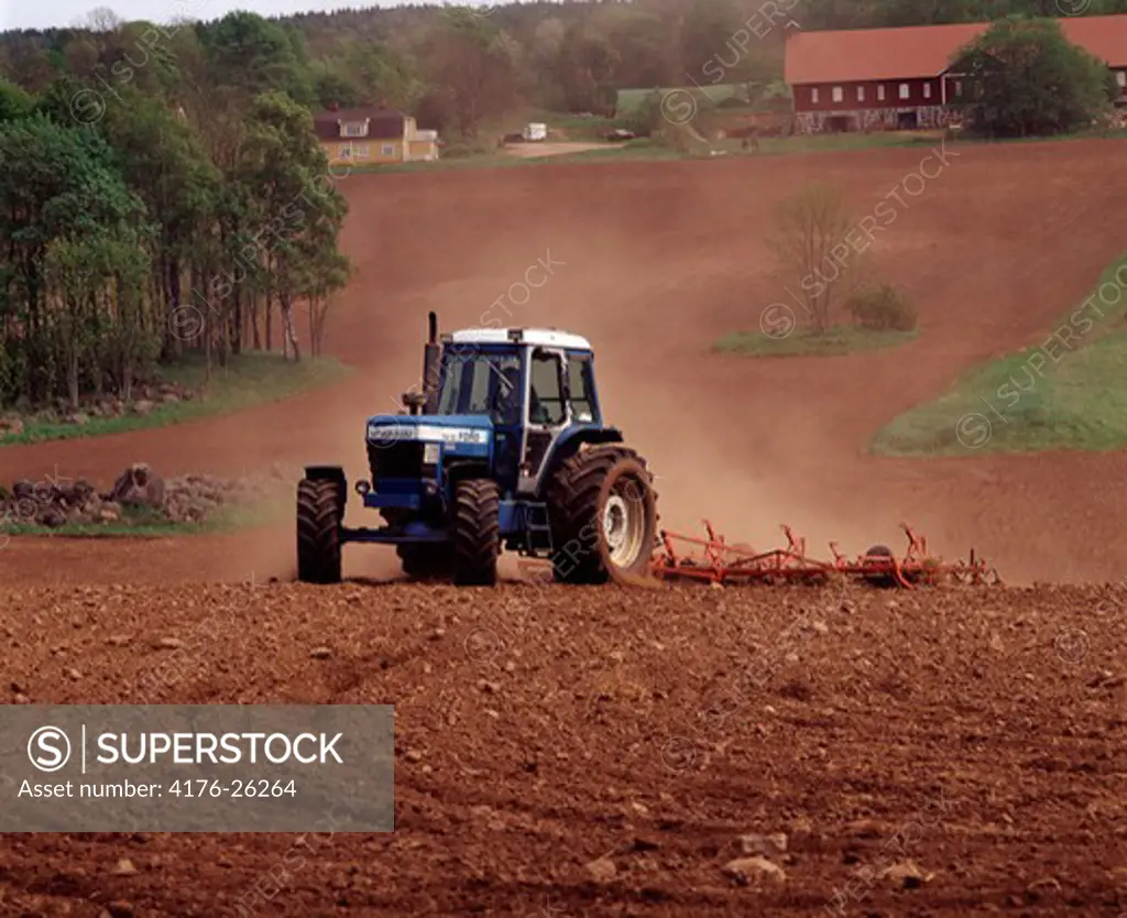 Tractor ploughing in a field