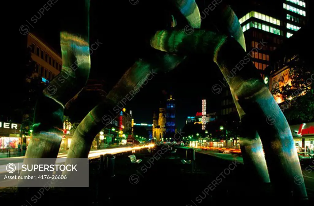 Germany, Berlin - Sculpture in front of a church at night, Kaiser Wilhelm Memorial Church, Tauentzienstrasse