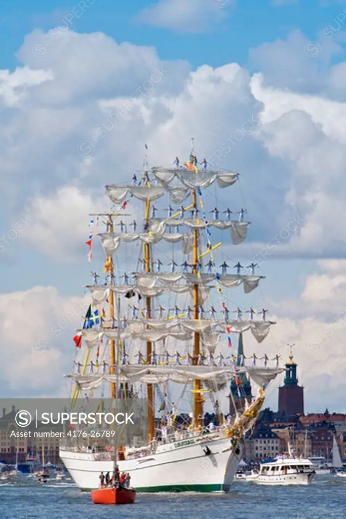 Sweden, Stockholm - Sailboats and a ferry in the sea - Tall Ship Race 2015