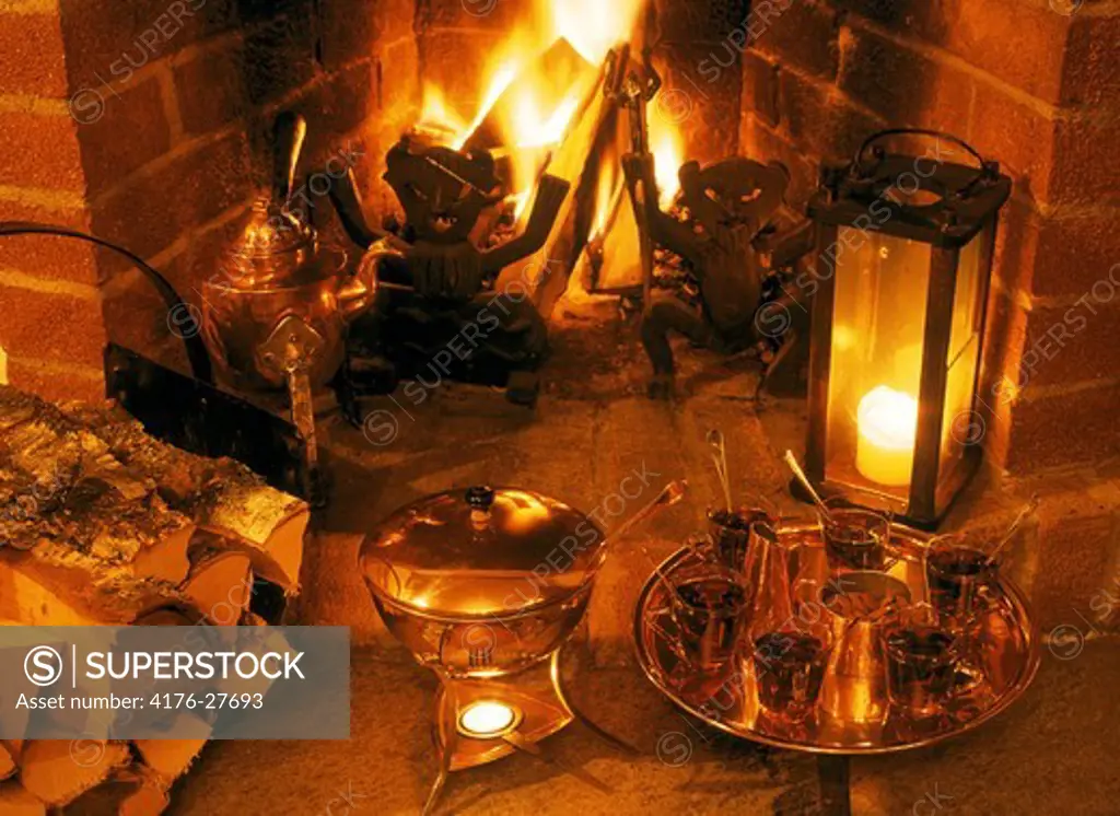 Warm fireplace and warm glogg for cold winter nights in Sweden