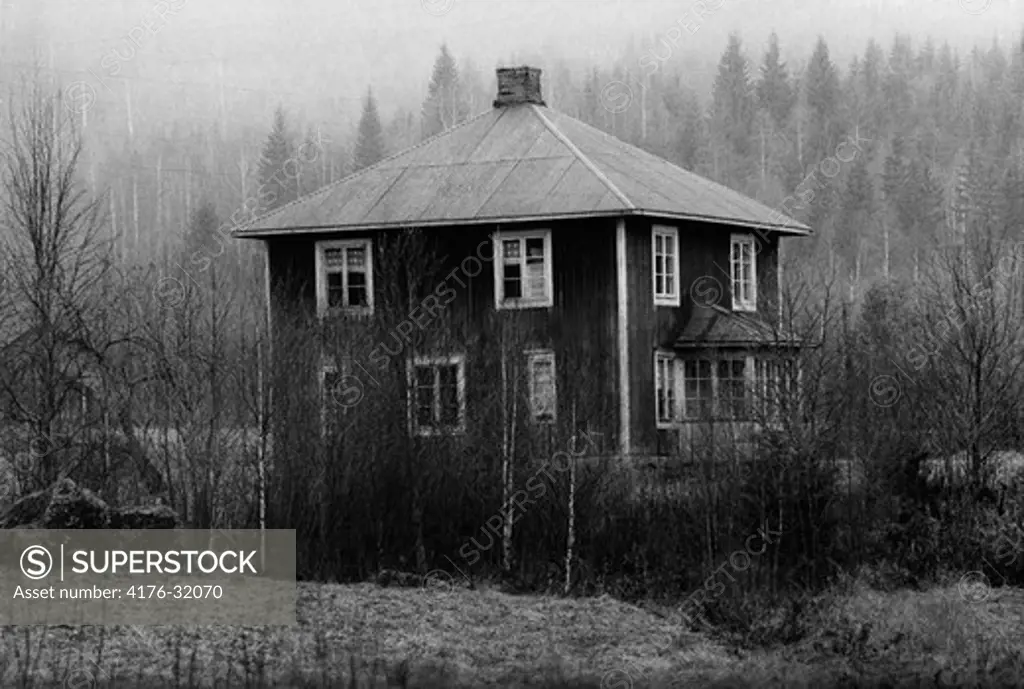 Old house and landscape behind. Varmland (Varmland) Sweden