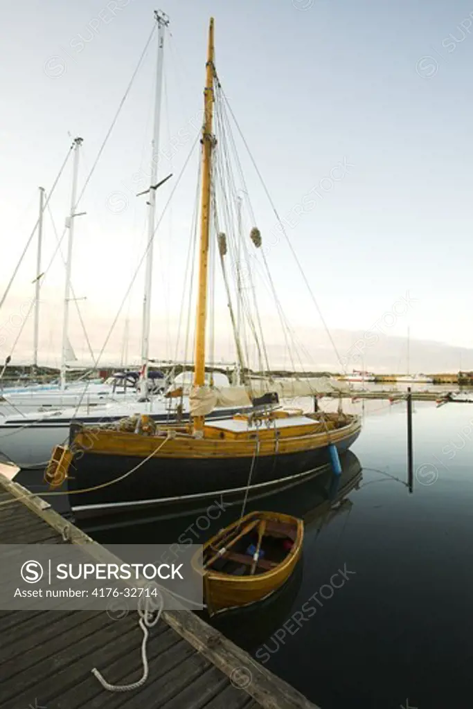 Old wooden boat in harbour, westcoast. Sweden.