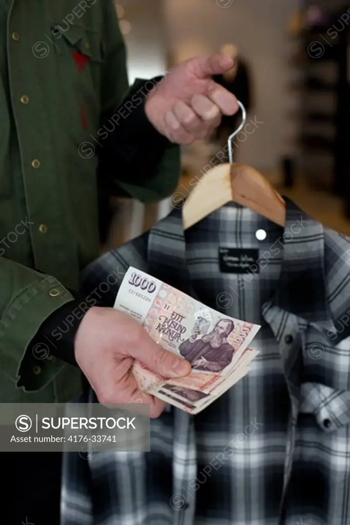 Customer purchasing shirt, Reykjavik, Iceland