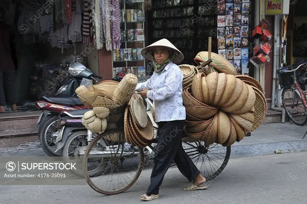 Woman selling baskets in Hanoi, Vietnam 2008