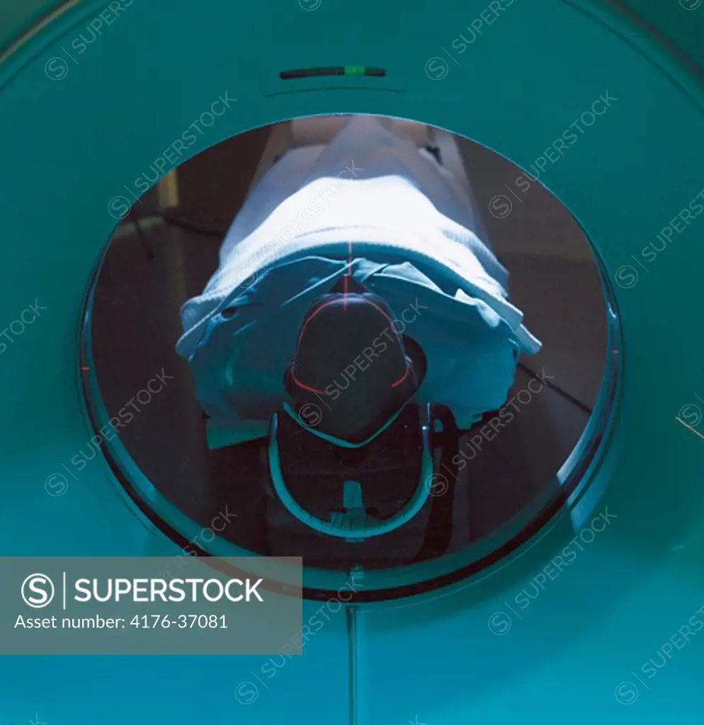 High angle view of a person getting MRI scan