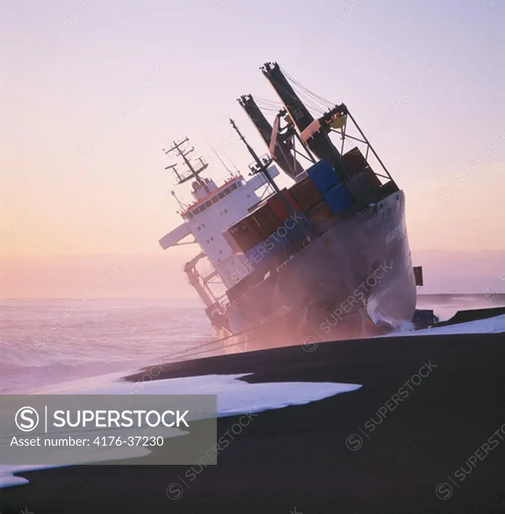 A large cargo ship Vikartindur stranded on a black sandy íƒÅ¾ykkvarbaejar beach