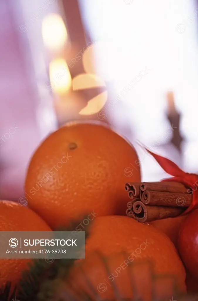 Oranges with cinnamonsticks