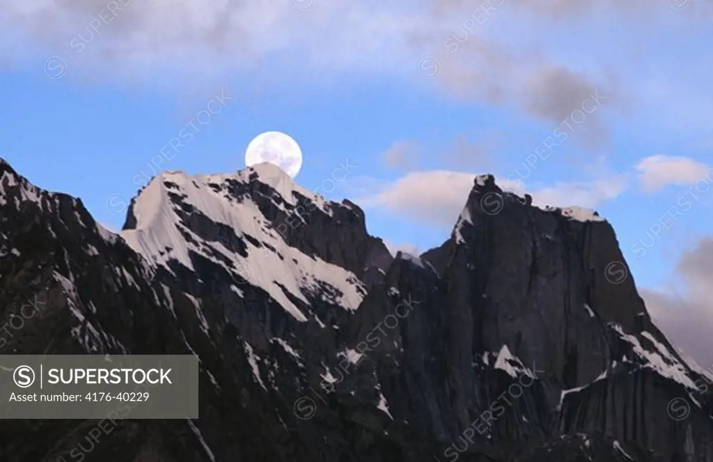 Moon over mountain tops