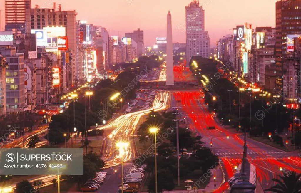 Avenida 9 de Julio at dusk in Buenos Aires with Obelisk and traffic