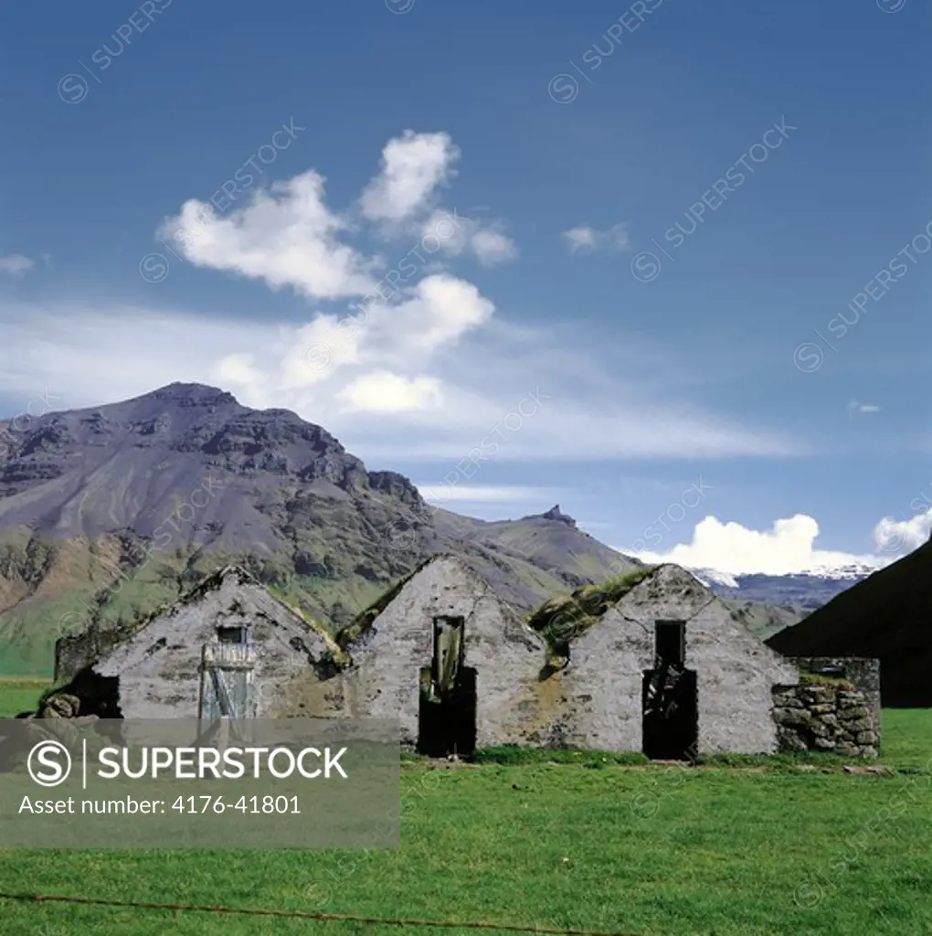 Ruins of a turf house in the countryside, mountains