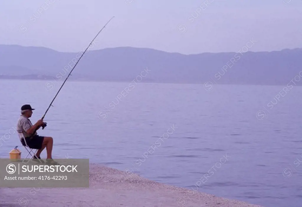 Solitary fisherman, Greece