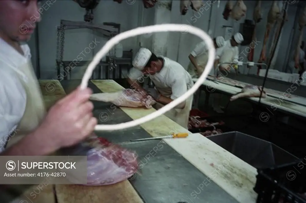 Men working in a slaughterhouse