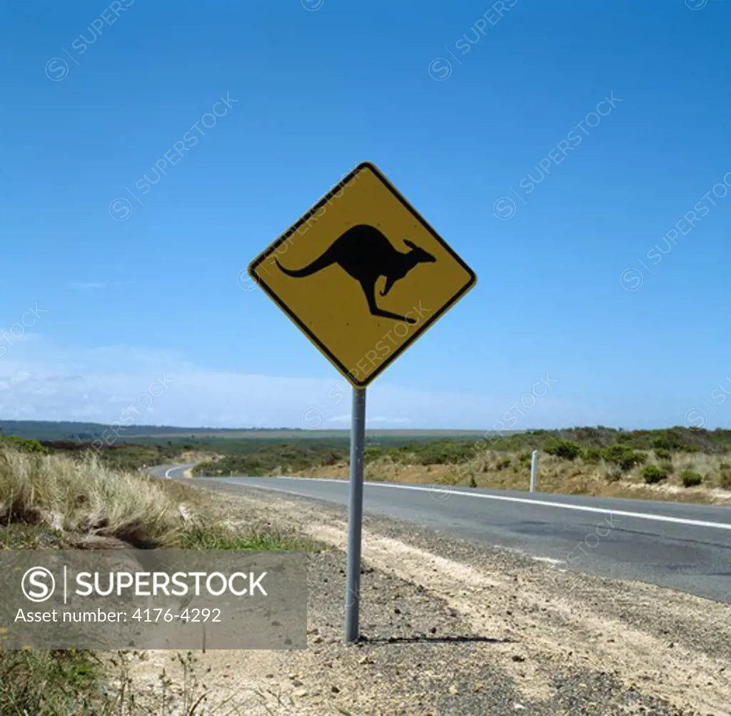 Kangaroo Crossing signboard at the roadside, Australia