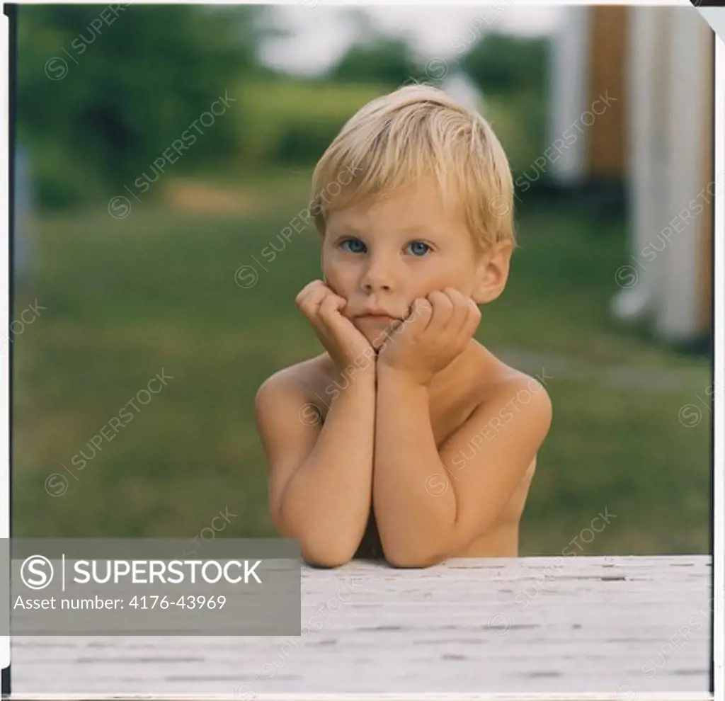 Boy sitting at a table