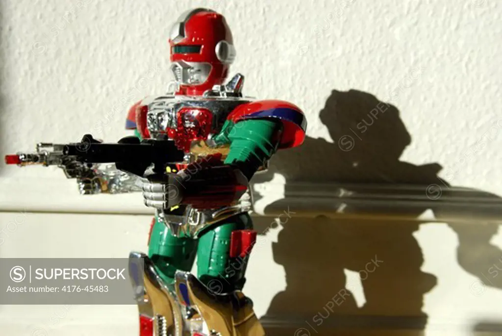 Toy robot with weapons inside apartment, Copenhagen, Denmark.